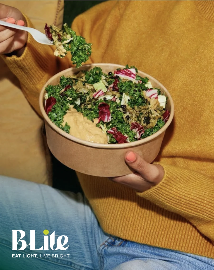 A BLite kale and hummus bowl eaten at home